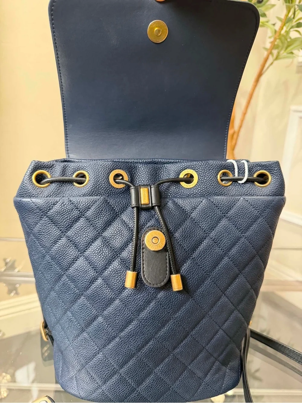 CHANEL Quilted Navy Caviar Leather Backpack with Gold Hardware